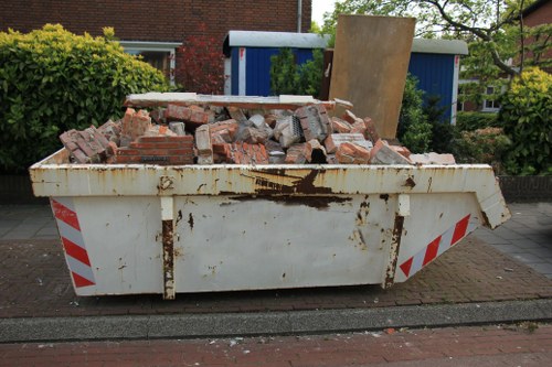 Professionals clearing a flat in Honor Oak